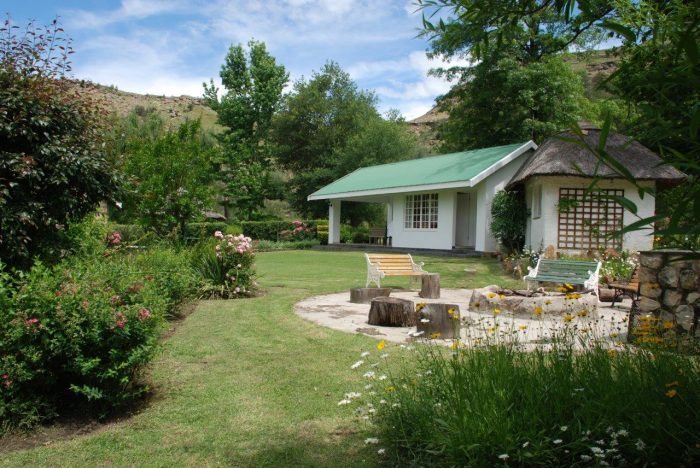 Esigodini Cottage Outside Cottage and thatch room